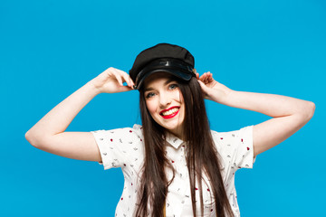 fashion portrait of stylish photographer girl holding vintage retro camera