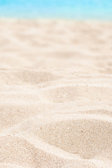 Fototapeta na wymiar Sea, sand and summer day background. Summer time wallpaper.