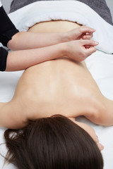 Obraz na płótnie Canvas Spa massage for beautiful pretty woman