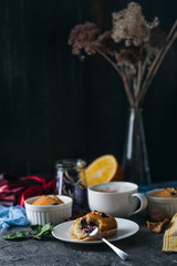 spring breakfast with muffins in rustic style