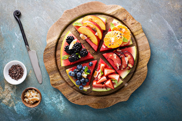 Watermelon pizza with various fruts