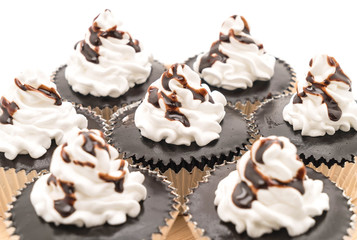 chocolate cup cake with whipped cream