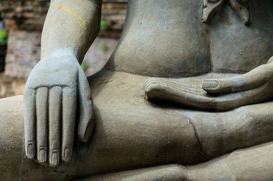 Close up hand of statue Buddha