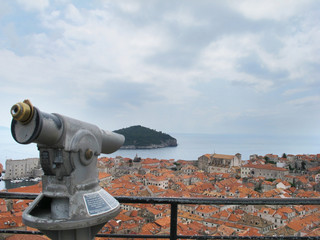 Fototapeta na wymiar telescope pointing to the old croatian city of Dubrovnik
