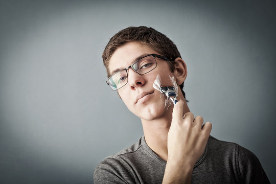  Teenager Shaving For The First Time