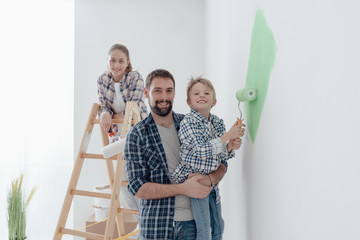 Family painting a room together