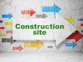 Construction concept: arrow with Construction Site on grunge wall background