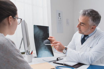 Radiologist checking an x-ray image