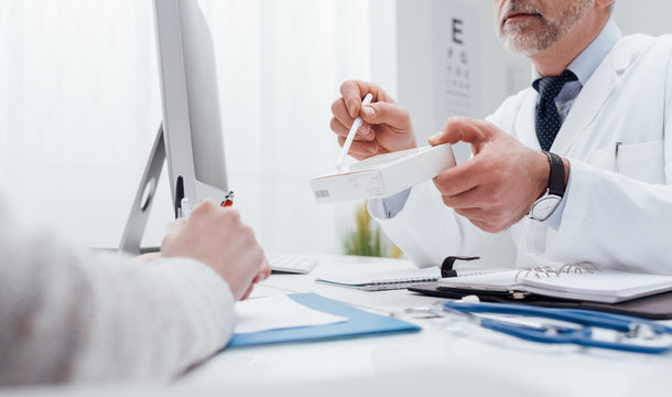 Doctor giving a prescription medicine