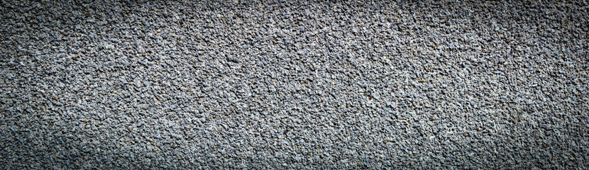 Texture of small gray crumbs of basalt, abstract background