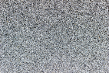 Texture of small gray crumbs of basalt, abstract background