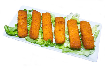 Fish sticks on tray on a white background seen from above