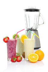 Healthy Smoothies with fresh fruits and a Blender isolated on white, for a good fit start in your day