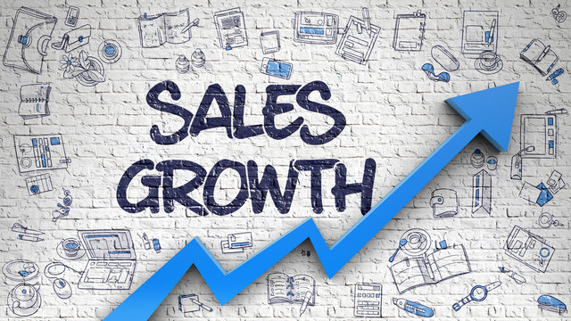 Sales Growth Drawn on Brick Wall. 