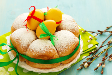 Traditional Easter cakes with colored eggs.