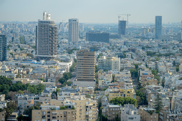 Obraz premium Panoramic view on roofs of Tel-Aviv on the modern buildings background