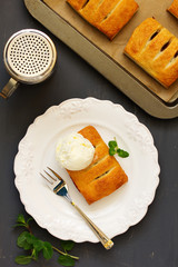 Homemade cakes and puff pastry with apples and caramel.