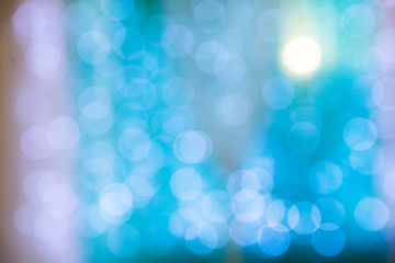 Fototapeta premium Colorful circular blue abstract bokeh background