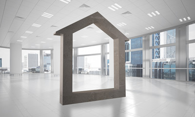 Obraz premium Conceptual background image of concrete home sign in modern office interior