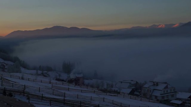 Dawn fog village winter forest