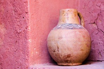 Old clay ceramic vase in light brown colour