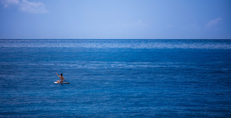 paddleboarding in ocean