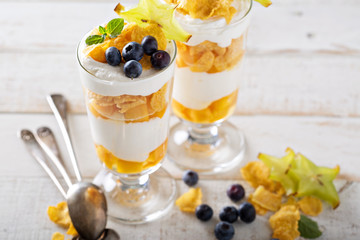 Yogurt cereal parfait with mango