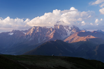 Mountain landscape with the peak of the clouds