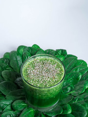 Healthy green smoothie with spinach and chia. Copy space.