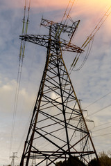 silhouette of high voltage electrical pole structure.