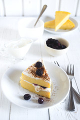 Cottage cheese baked pudding, sour cream and blueberries