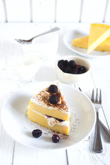 Cottage cheese baked pudding, sour cream and blueberries