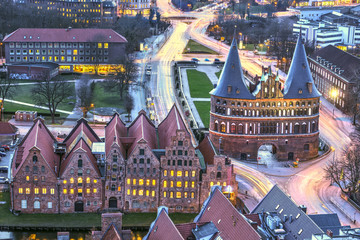 Holstentor Gate during twilight. View over the city, Lubeck, Germany