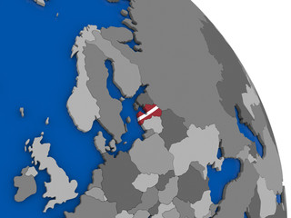 Latvia and its flag on globe