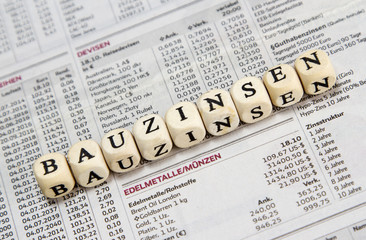 Obraz premium construction interest word built with letter cubes