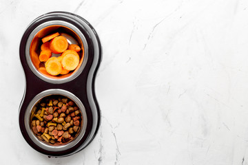 Vegetables and petfood on kitchen table background top view mock up