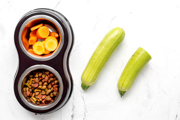 organic pets food with zucchini and carrot on table background top view mockup
