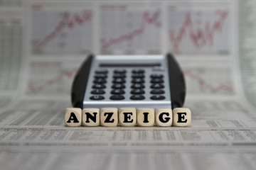 advertisement word built with letter cubes