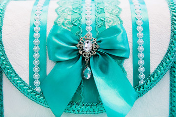 Wedding money box decorated with turquoise ribbons