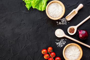 ingredients for paella on dark background top view