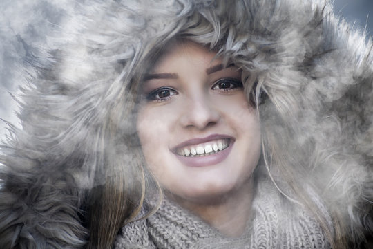 Headshot of agirl smiling in winter