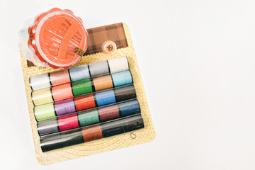 new sewing supplies (Nicky and needles) in the package on white background