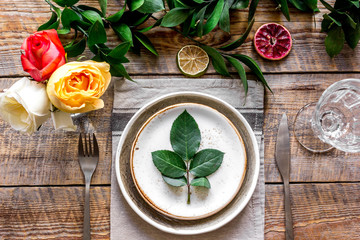 ceramic tableware top view on wooden background mock up