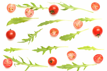 fresh vegetable, cherry tomato and green arugula isolated on white