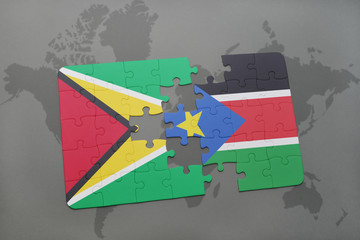 puzzle with the national flag of guyana and south sudan on a world map