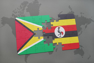 puzzle with the national flag of guyana and uganda on a world map
