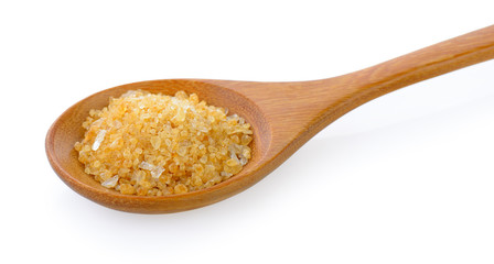 Sugar for coffee in wood spoon on white background