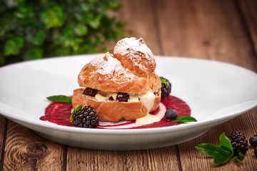Gentle dessert with cream and berries.
