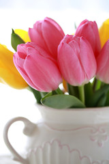 Fototapeta premium チューリップ Pink tulip flowers in white vase close up
