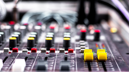 Beautiful closeup shot of Sound mixing control panel for recording music and live telecasts